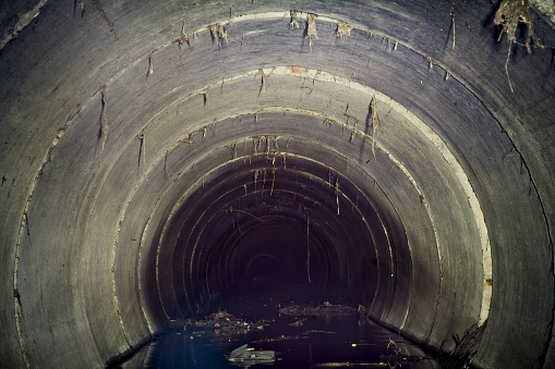 A sewer pipe with stagnant water